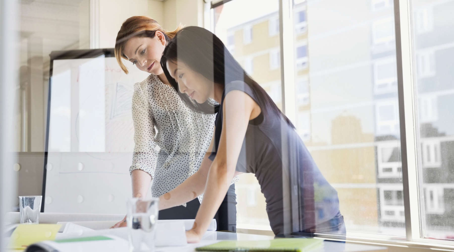 Two women in office