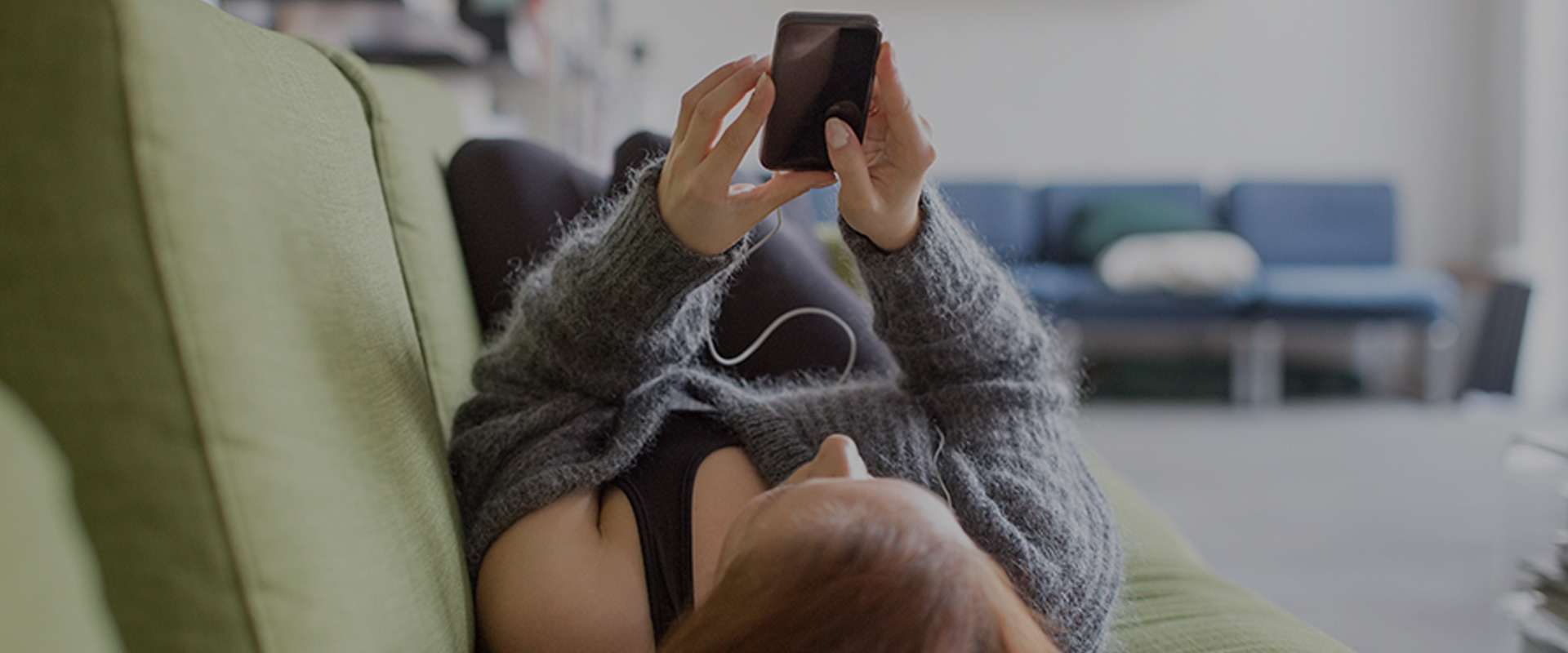 teenager using her smartphone