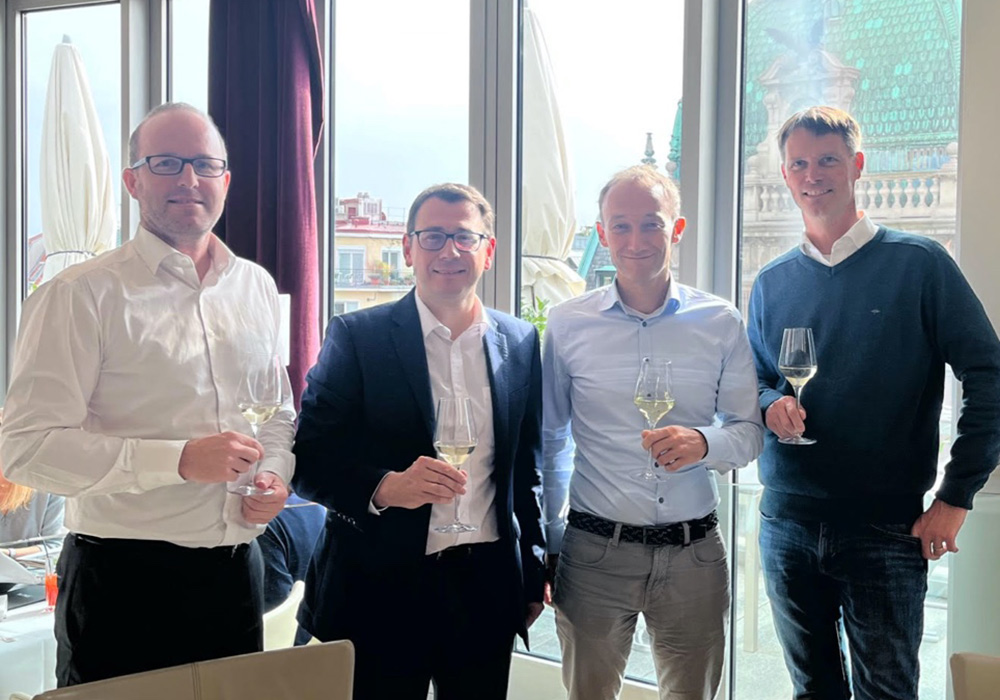Group photo celebrating the acquisition of Tapkey