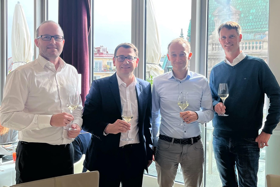 Group photo celebrating the acquisition of Tapkey