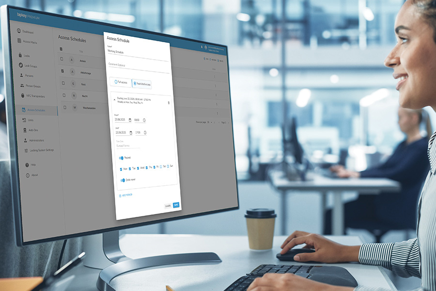 Woman managing Tapkey Premium Software on computer