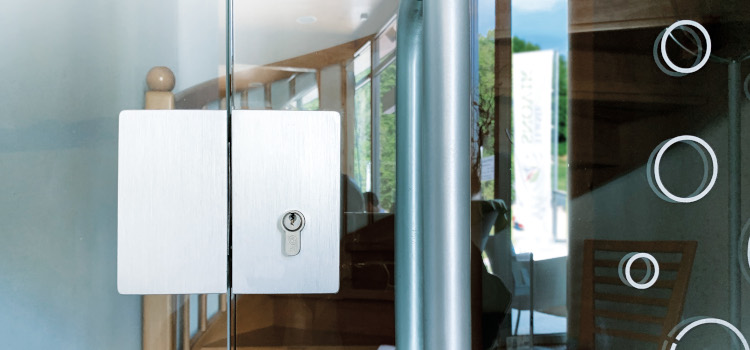 Titan cylinder in glass door